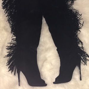 Black thigh high fringe boots